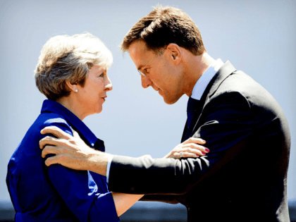 Dutch Prime Minister Mark Rutte receives his British counterpart Theresa May for a work lunch at the Catshuis, The Hague, on July 3, 2018. - The two heads of government will discuss the political and economic relations between the two countries and about the Brexit. (Photo by Koen van Weel …
