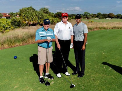 Donald Trump golfs with golf legends Tiger Woods and Jack Nicklaus at the National Golf Club in Jupiter, Florida, on February 2, 2019.