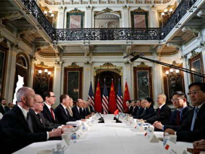 U.S. and Chinese delegations meet in the Indian Treaty Room in the Eisenhower Executive Office Building on the White House complex, during continuing meetings on the U.S.-China bilateral trade relationship, Thursday, Feb. 21, 2019, in Washington. Chinese Vice Premier Liu He, third from right, sits across the table from the …