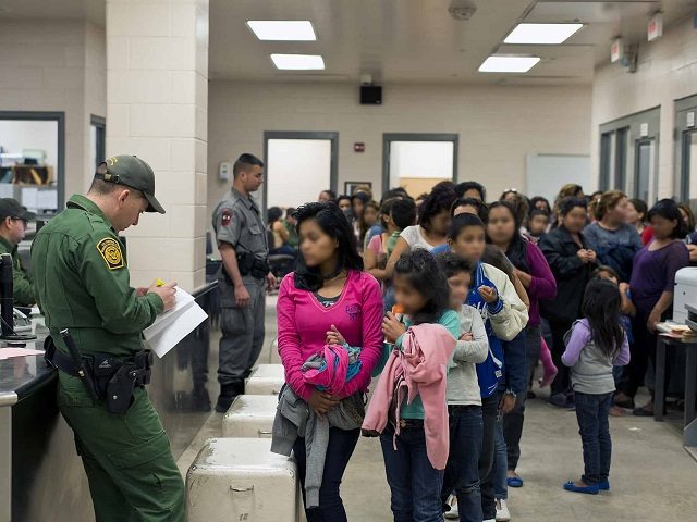 Border Patrol agents processing unaccompanied minors. (Photo: U.S. Customs and Border Protection/Hector Silva)