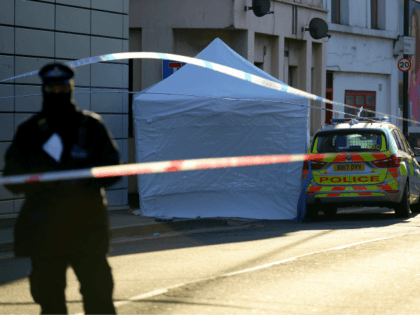 LONDON, ENGLAND - APRIL 05: A forensic tent covers the scene where a man, aged 20, collaps