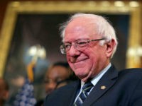 bernie-sanders-smiling-11619-Getty WASHINGTON, DC - JANUARY 16: Sen. Bernie Sanders (I-VT) attends an event to introduce the Raise The Wage Act in the Rayburn Room at the U.S. Capitol January 16, 2019 in Washington, DC. The proposed legislation, which will gradually raise the minimum wage to $15 by 2024, is unlikely to …