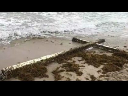 FORT LAUDERDALE, FLA. (WSVN) - A giant cross washed ashore near a Fort Lauderdale Beach hotel over the weekend, spawning curiosity among beachgoers and employees as to how it arrived in South Florida.