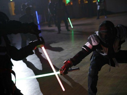 In this Sunday, Feb. 10, 2019, photo, competitors battle during a national lightsaber tour