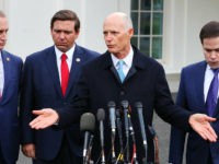 WASHINGTON, DC - JANUARY 22: Sen. Rick Scott (R-FL) speaks to the media while flanked by (L-R) Rep. Mario Diaz-Balart (R-FL), Florida Governor Ron DeSantis and Sen. Marco Rubio (R-FL), after a meeting with President Donald Trump regarding Venezuela on January 22, 2019 in Washington, DC. (Photo by Mark Wilson/Getty …