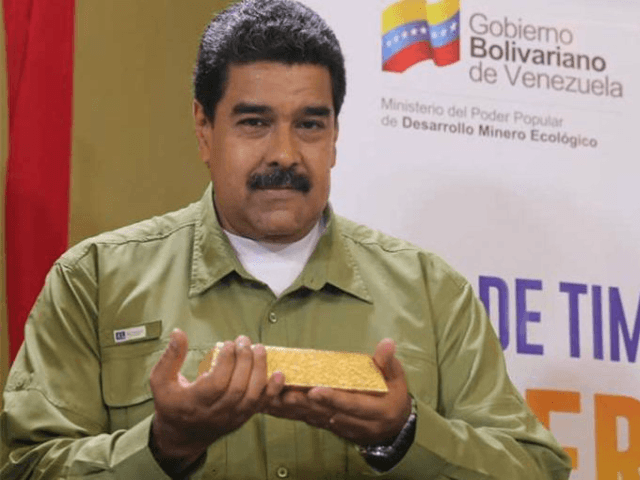Venezuelan President Nicolás Maduro hefts a bar of gold purportedly dug and processed in