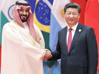 HANGZHOU, CHINA - SEPTEMBER 04: Chinese President Xi Jinping (right) shakes hands with Saudi Arabian Crown Prince Mohammed bin Salman bin Abdulaziz Al Saud to the G20 Summit on September 4, 2016 in Hangzhou, China.