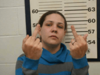 A New Jersey woman suspected of breaking into cars showed cops how she really felt about her arrest — by flipping the bird with both hands in her mugshot. A New Jersey woman suspected of breaking into cars showed cops how she really felt about her arrest — by flipping the bird with both hands in her mugshot.