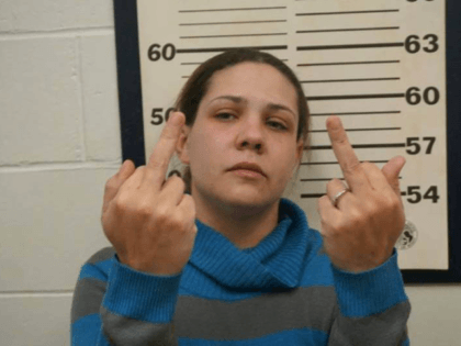 A New Jersey woman suspected of breaking into cars showed cops how she really felt about h