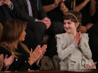 WASHINGTON, DC - FEBRUARY 05: First lady Melania Trump with Grace Eline, special guest of President Donald Trump, looks during of the State of the Union address in the chamber of the U.S. House of Representatives on February 5, 2019 in Washington, DC. President Trump's second State of the Union …