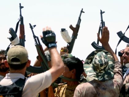By law or force: Iraq's Shiite armed groups vow to oust US troops