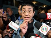 Philippine journalist Maria Ressa managed to speak to reporters at the National Bureau of Investigation after her arrest in Manila Wednesday Philippines arrests Duterte critic journalist Maria Ressa