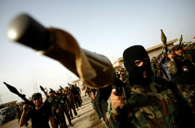 Bomb blast kills eight Shiite militiamen in Iraq