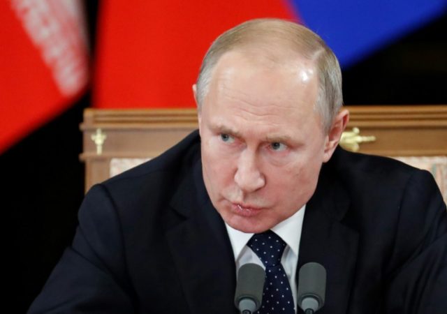 Putin to give annual address as popularity slides