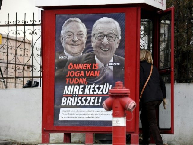 Merkel voices 'full solidarity' with Juncker in Orban row