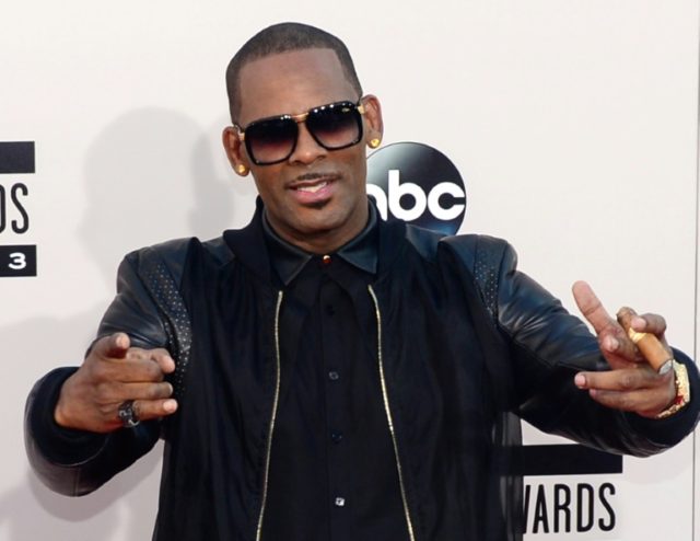 Facing charges of sex abuse against minors, R. Kelly surrenders to police