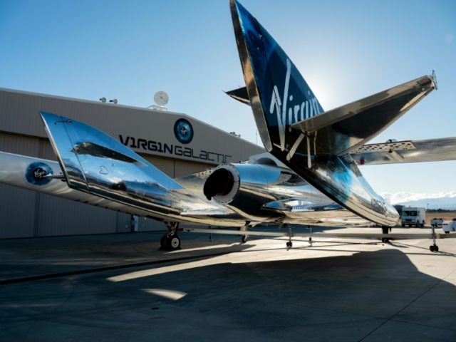 SpaceShipTwo mates to the mothership, WhiteKnightTwo, at Mojave Space Port on February 19, 2019, in Mojave, California Virgin Galactic takes crew of three to altitude of 55 miles