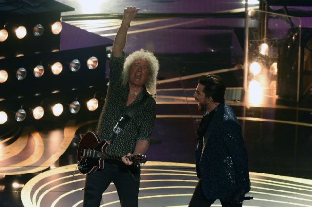 Member of British rock band Queen Brian May (L) and US singer-songwriter Adam Lambert performs during the 91st Annual Academy Awards Oscars gala opens with performance by Queen
