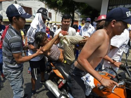 'They shot at us,' say injured Venezuela protesters