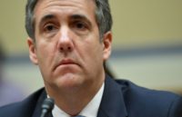 Ex-Trump lawyer brands president 'conman' and 'racist'