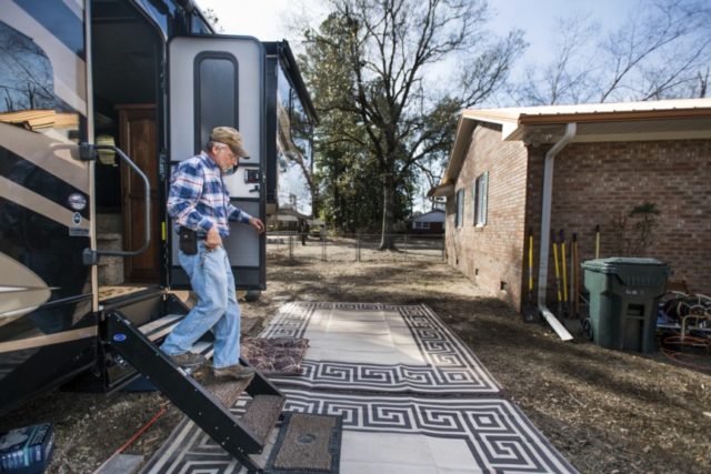 Preparing for Floods Kevin Tovornik exits his travel camper located in the back yard of his home damaged by flooding from Hurricane Florence near the Crabtree Swamp Friday, Feb. 1, 2019, in Conway, S.C. Tovornik lost his air conditioner and duct work in the 2016 flood. In 2018, he saved his furniture, but still ended up losing the house. The Associated Press