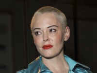 Actress Rose McGowan poses for photographers prior to the Pam Hogg Spring/Summer 2019 runway show at London Fashion Week in London, Friday, Sept. 14, 2018. (Photo by Vianney Le Caer/Invision/AP)