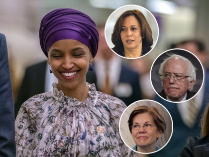 Rep. Ilhan Omar, D-Minn., walks through an underground tunnel at the Capitol as top House