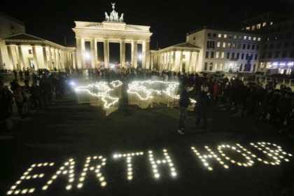 Activists of the World Wide Fund For Nature (WWF) set up led-lights in front of the illuminated Brandenburg Gate to mark Earth Hour, in Berlin, Saturday, March 30, 2019. The global event Earth Hour is the symbolic switching off of the lights for one hour to help minimalize fossil fuel …