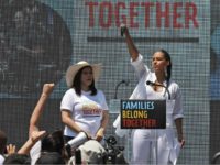 FILE - In this June 30, 2018 file photo, America Ferrera, left, with Alicia Keys, attends a protest against the Trump administration's approach to illegal border crossings and separation of children from immigrant parents in Lafayette Square across from the White House in Washington. After paying a weekend visit to …