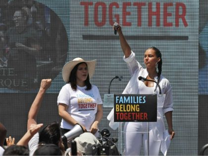 FILE - In this June 30, 2018 file photo, America Ferrera, left, with Alicia Keys, attends a protest against the Trump administration's approach to illegal border crossings and separation of children from immigrant parents in Lafayette Square across from the White House in Washington. After paying a weekend visit to …