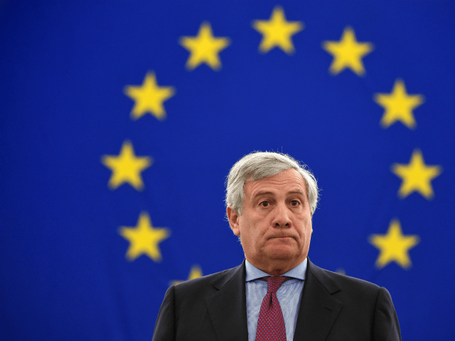 President of the European Parliament, Antonio Tajani stands as MP's observe a minute of si