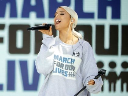 WASHINGTON, DC - MARCH 24: Ariana Grande performs 'Be Alright' during the March for Our Lives rally on March 24, 2018 in Washington, DC. Hundreds of thousands of demonstrators, including students, teachers and parents gathered in Washington for the anti-gun violence rally organized by survivors of the Marjory Stoneman Douglas …