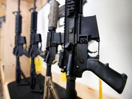 AR-15 semi-automatic guns are on display for sale at Action Target on June 17, 2016 in Spr
