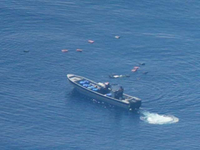 A CBP P-3 Orion Aircrew monitors the seizure of bails of cocaine in the eastern Pacific Ocean off the coast of Costa Rica. (Photo: U.S. Customs and Border Protection)