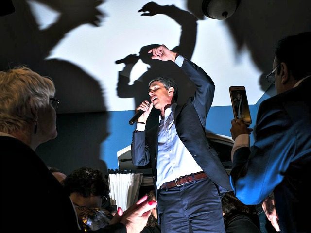 Beto O'Rourke Standing on a Table, Speaking and Flailing His Arms