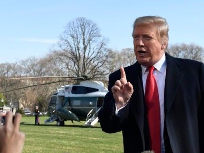 President Donald Trump talks with reporters before boarding Marine One on the South Lawn of the White House in Washington, Thursday, March 28, 2019, for the short trip to Andrews Air Force Base in Maryland. Trump is traveling to Michigan to speak at a rally before spending the weekend at …