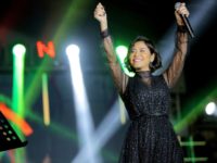 In this Dec. 31, 2018 photo, Egyptian singer Sherine Abdel-Wahab performs during New Years' Eve, in Cairo, Egypt. Abdel-Wahab has been banned from performing in her home country after suggesting that it does not respect free speech. (AP Photo/Mahmoud Abdel Nasser)