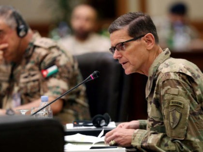 Commander of United States Central Command Joseph Leonard Votel (R), speaks during a meeting with the Gulf cooperation council's armed forces chiefs of staff in Kuwait City on September 12, 2018.