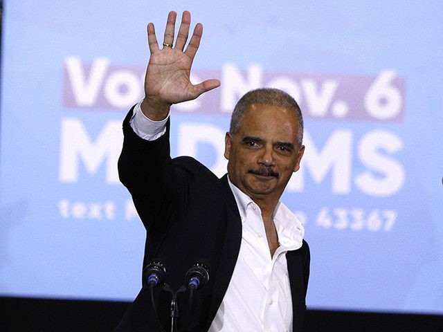DETROIT, MI - OCTOBER 26: Former Attorney General Eric Holder speaks at a rally to support Michigan democratic candidates at Cass Tech High School on October 26, 2018 in Detroit, Michigan. Holder, and former President Barack Obama, who was also at the rally, are among approximately a dozen democrats who …