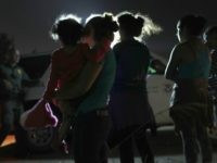 Rio Grande Valley Sector Border Patrol agents apprehend a group of Honduran migrant families. (File Photo: John Moore/Getty Images)