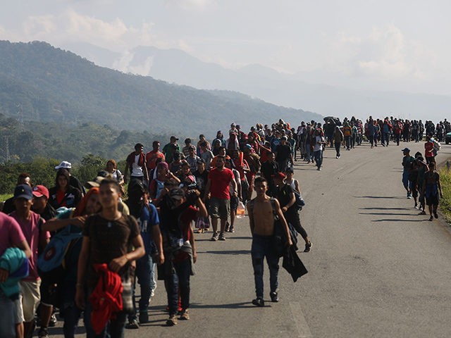 HUIXTLA, MEXICO - JANUARY 20: People from a caravan of Central American migrants walk alon