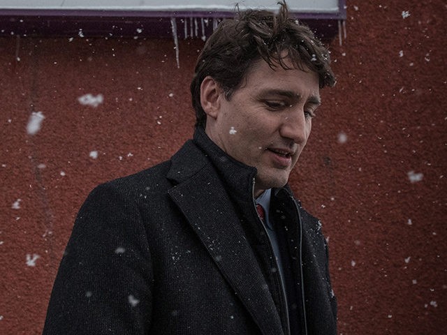 Canadian Prime Minister Justin Trudeau talks to the press after a meeting with the Muslim