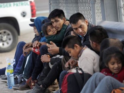 El Paso Sector Border Patrol agents apprehend migrant families who illegally crossed the b
