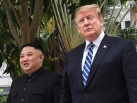 US President Donald Trump (R) walks with North Korea's leader Kim Jong Un during a break in talks at the second US-North Korea summit at the Sofitel Legend Metropole hotel in Hanoi on February 28, 2019. (Photo by Saul LOEB / AFP) (Photo credit should read SAUL LOEB/AFP/Getty Images)