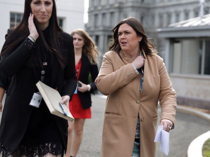 WASHINGTON, DC - FEBRUARY 15: White House Press Secretary Sarah Sanders speaks to members of the media outside the West Wing of the White House February 15, 2019 in Washington, DC. President Donald has declared a national emergency on Friday to free up federal funding to build a wall along …