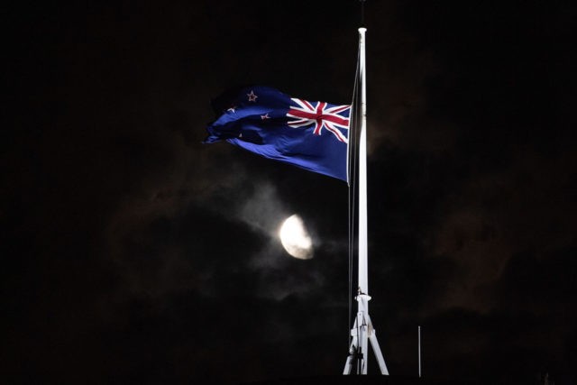 The New Zealand national flag is flown at half-mast on a Parliament building in Wellington on March 15, 2019, after a shooting incident in Christchurch. - Attacks on two Christchurch mosques left at least 49 dead on March 15, with one gunman -- identified as an Australian extremist -- apparently …