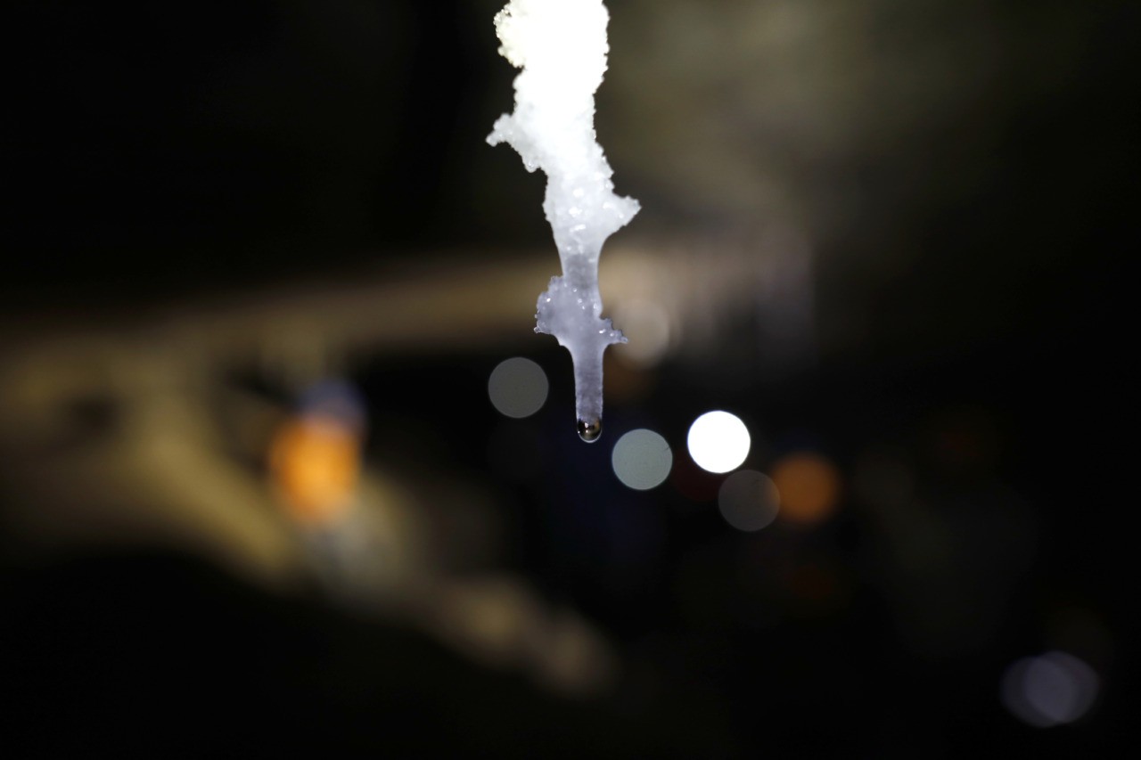 This picture taken on March 27, 2019 shows a drop of water dripping from a salt stalactite in the Malham cave inside Mount Sodom, located at the southern part of the Dead Sea in Israel. - Israeli spelunkers announced on March 27 that a salt cave near the Dead Sea was over ten kilometres long, beating Iran's N3 cave in Qeshm to make it the world's largest. The cave, named Malham, is a series of canyons running through Mount Sodom, Israel's largest mountain, and spilling out to the southwest corner of the adjacent Dead Sea. (Photo by MENAHEM KAHANA / AFP) (Photo credit should read MENAHEM KAHANA/AFP/Getty Images)
