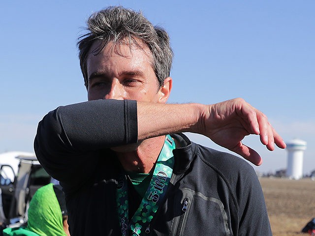 NORTH LIBERTY, IOWA - MARCH 16: Democratic presidential candidate Beto O'Rourke wipes away sweat after finishing the Lucky Run 5k race March 16, 2019 in North Liberty, Iowa. After losing a long-shot race for U.S. Senate to Ted Cruz (R-TX), the 46-year-old O'Rourke is making his first campaign swing through …