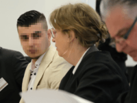 DRESDEN, GERMANY - MARCH 18: (EDITORS NOTE: Part of this image has been pixellated to obscure the identity of the defendant) Alaa S. (L) sits with his lawyers Ricarda Lang and Frank Wilhelm Drücke as he arrives in court for the first day of his trial for the possible murder …