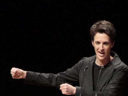 MUNCIE, IN - DECEMBER 02: Rachel Maddow discusses the headlines of the day in Emens Auditorium at Ball State University, David Letterman's alma mater, on December 2, 2011 in Muncie, Indiana. (Photo by Ron Hoskins/Getty Images)